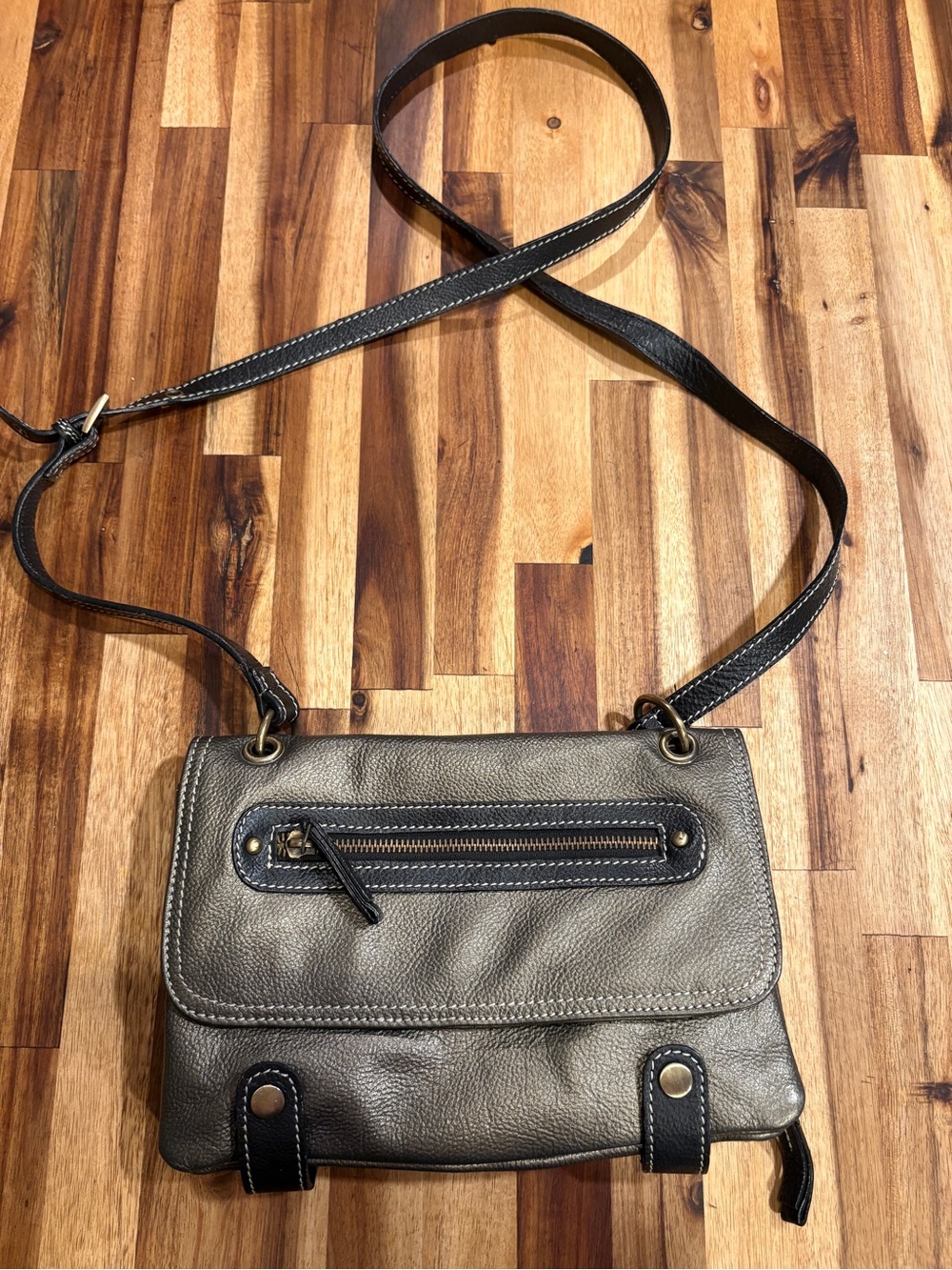 Sophia Visconti Metallic Gray Pebbled Leather Crossbody with Black Trim
